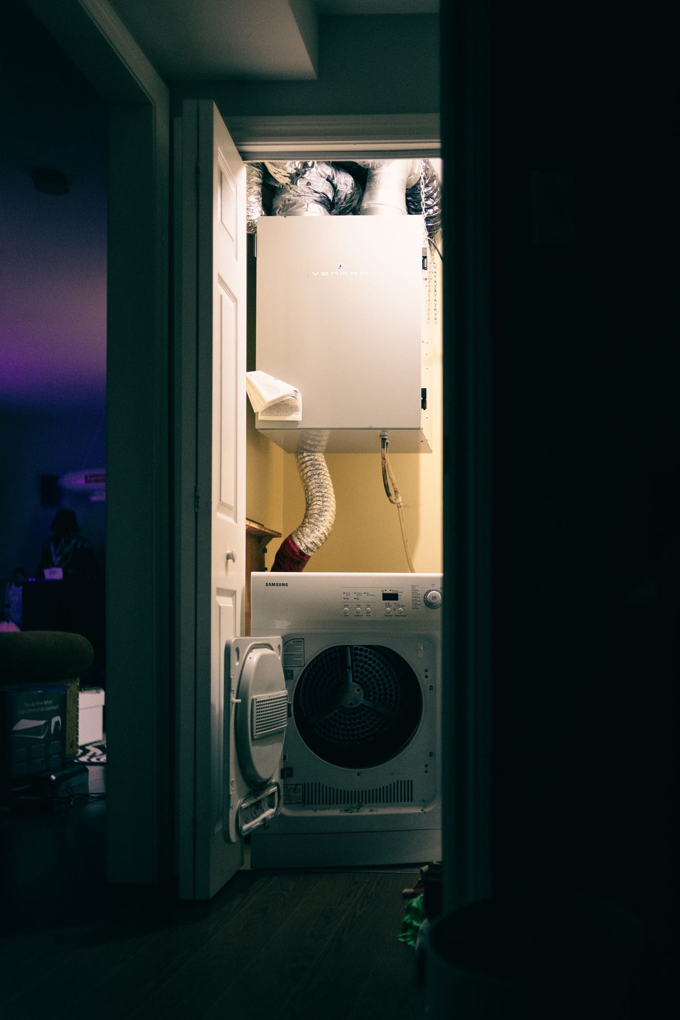 Home laundry closet with dryer and ventilation system